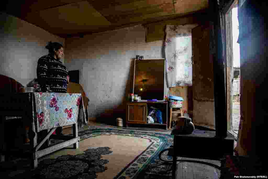 Svetlana, a shepherd's wife, in her home.