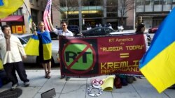 Акція у США проти спотворення дійсності російським телебаченням у висвітленні агресії Росії щодо України. Вашингтон, 11 квітня 2014 року