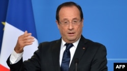 French President Francois Hollande says he wants proof that Iran has abandoned military nuclear research.