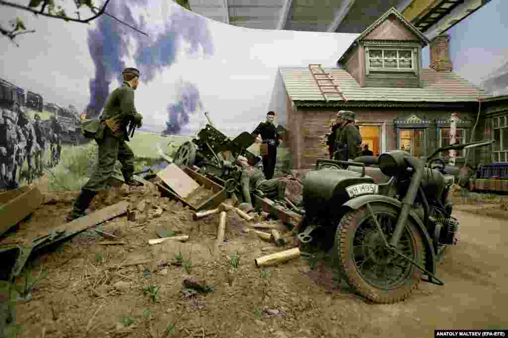 Nazi troops inside a Soviet village. The exhibition is designed to be walked through, and none of the exhibits will be roped off from visitors.