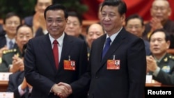 China's new prime minister and president, Li Keqiang (left) and Xi Jinping.