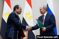 Russian President Vladimir Putin (right) and Egyptian President Abdel-Fattah el-Sisi in Sochi, Russia, on October 17, 2018. Rosatom is building four nuclear reactors in El Dabaa, Egypt, along the Mediterranean Sea coast.