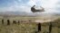 FILE: U.S. military Chinook helicopter lands on a field outside the governor's palace in Maidan Shar, the capital of Wardak Province.
