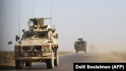 Camioane militare americane în Siria, în provincia estică Deir Ezzor, 31 ianuarie 2019