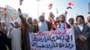 Member's of Najaf's Shiite clerical community and religious studies students calling for reform take part in anti-government protests in the central Iraqi holy city on October 29, 2019. - Anti-government rallies have rocked Iraq since Octobe 25, denouncin