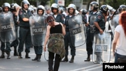 Armenia - Riot police confront a protester in Yerevan, 23Jun2015.