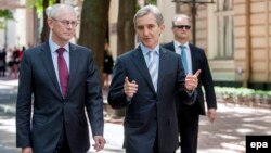 European Council President Herman Van Rompuy (left) talks with Moldovan Prime Minister Iurie Leanca in Chisinau on May 13.