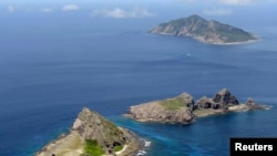 Острова Сенкаку в Восточно-Китайском море.
