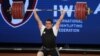 Sohrab Moradi from Iran sets a world record of 233 kilograms during the clean and jerk competition at the Weightlifting World Championships in Anaheim, California, on December 3. 