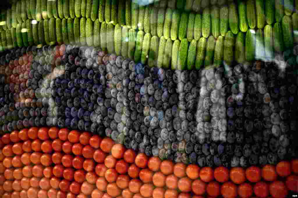 Gherkins, berries, and tomatoes on display on the opening day of the Golden Autumn agricultural exhibition in Moscow on October 5. (epa/Maxim Shipenkov)