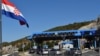 Bosnia-Herzegovina - A traffic jam at the border crossing between Bosnia and Croatia, located in the village of Zaton Doli, along Croatia's main Adriatic route, 27Sep2018