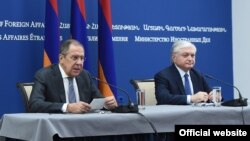 Russian Foreign Minister Sergei Lavrov (left) and Armenian Foreign Minister Edward Nalbandian hold a joint press conference in Yerevan on November 21.