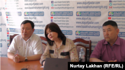 Members of the Atazhurt Eriktileri group give a press conference in June of this year. The person claiming to be the new head of the group, Erbol Dauletbekuly, is on the right. 