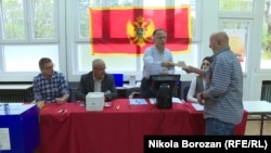 Voters at a polling station in Podgorica on April 15