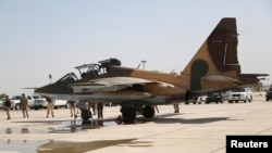 A Russian Sukhoi Su-25 fighter plane arrives at Iraq's Al-Muthanna military airbase at Baghdad airport earlier this month.