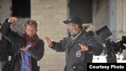 Director Sam French (left) says he had to overcome many challenges to complete the filming of the "Buzkashi Boys" in Kabul.