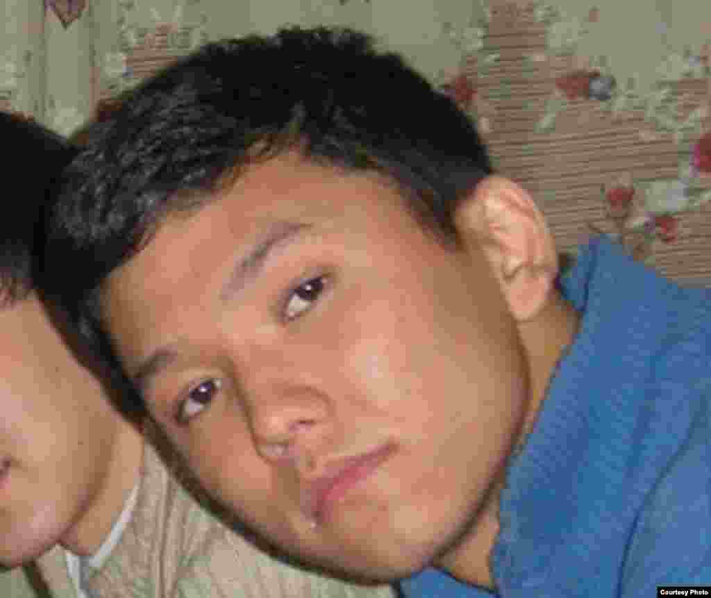 An undated photo of Rahimjan Makhatov, showing him in the company of a friend during his studies at university. Makhtatov is blamed for the suicide attack on a local branch of the National Security Committee on May 17.