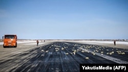 Precious metal ingots lie on the runway of an airport in Yakutsk, eastern Russia.