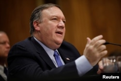 Secretary of State Mike Pompeo testifies before the Senate Foreign Relations Committee on July 25: "President Trump is well aware of the challenges that Russia poses to the United States."