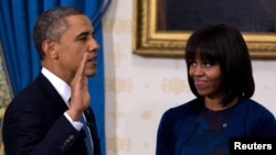 АҚШ президенті Барак Обама мен оның жұбайы Мишель Обама. Вашингтон, 20 қаңтар 2013 жыл