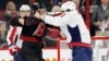 The Washington Capitals' Alex Ovechkin (right) punches the Carolina Hurricanes' Andrei Svechnikov during the first period on April 15.