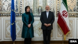 EU foreign policy chief Catherine Ashton and Iranian Foreign Minister Mohammad Javad Zarif at a news conference in Tehran on March 9