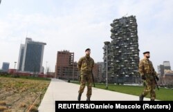 Офицеры итальянской армии патрулируют опустевшие улицы Милана, март 2020 года