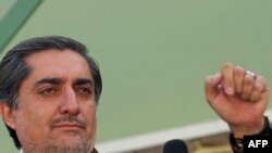 Presidential election candidate Abdullah Abdullah addresses a press conference at his residence in Kabul on October 15.