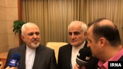 IRAN - Iranian foreign minister Mohammad Javad Zarif in Beijing airport speaking with reporters. May 17, 2019