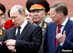 Vladimir Putin și Serghei Ivanov.