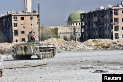 28 ноября, БМП армии Асада в одном из отбитых у оппозиции районов Алеппо