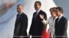 France/Germany - L to R) NATO Secretary General General Jaap de Hoop Scheffer, US President Barack Obama, French President Nicolas Sarkozy and German Chancellor Angela Merkel are pictured after crossing a bridge from Kehl, Germany into Strasbourg, 04Apr20