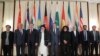  Russian Foreign Minister Sergei Lavrov (center) and members of Taliban delegation pose before the multilateral peace talks on Afghanistan in Moscow