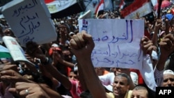 Egyptian pro-democracy activists have been demanding that the ruling military council speed up reforms.