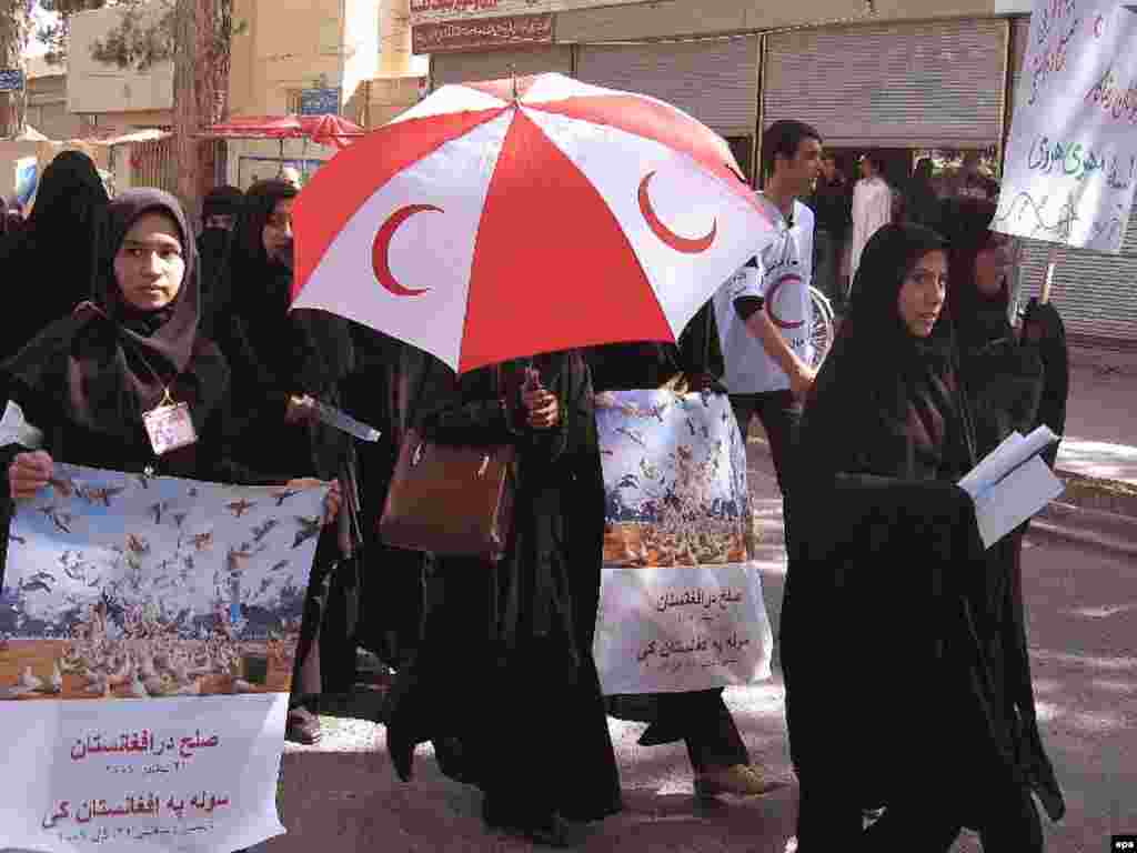 These girls were among thousands marching for peace in Herat (epa) - Text by Abubakar Siddique of RFE/RL's Radio Free Afghanistan, photos 1-5 by Pajhwok News Agency.