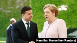 Президент Украины Владимир Зеленский и канцлер Германии Ангела Меркель. Берлин, 18 июля 2019 года