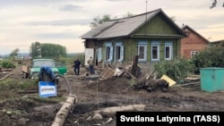 Последствия наводнения в Тулуне, Россия. 6 июля 2019 года