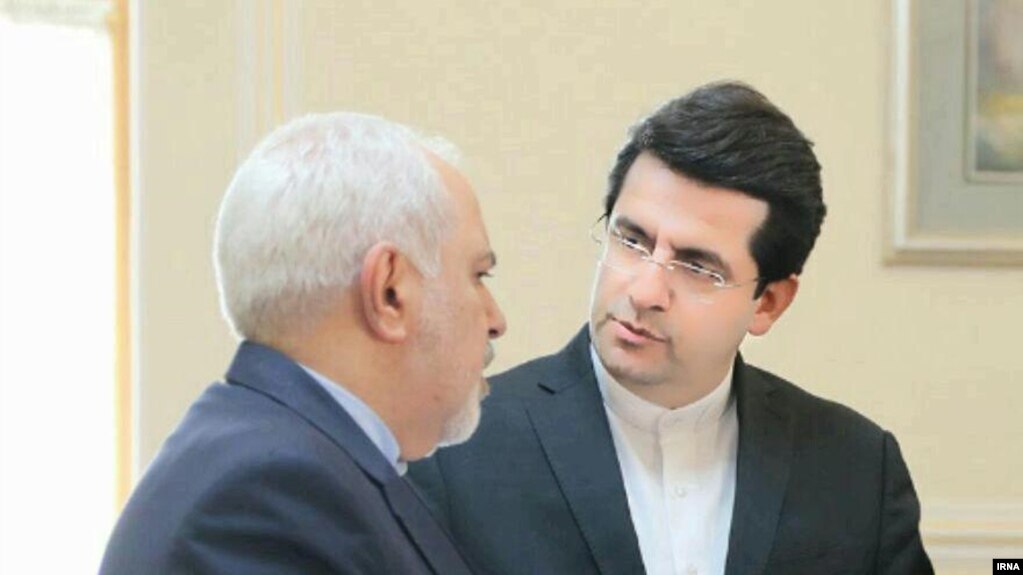 Abbas Mousavi, new spokesman of Iran's foreign ministry speaking with foreign minister Javad Zarif. Undated