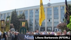 Moldovans protest against the official registration of Muslim group in Chisinau on May 18.