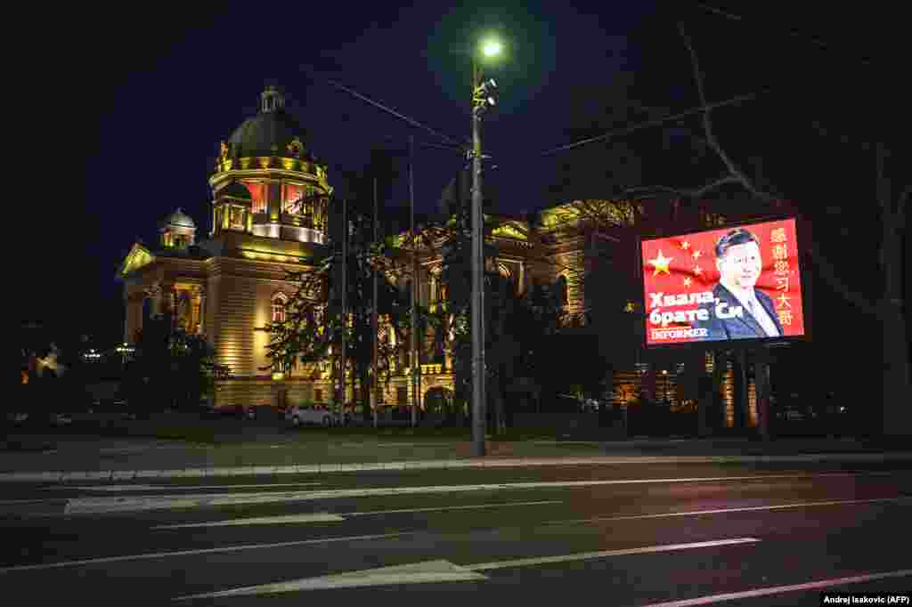 A screen says &quot;thanks&rdquo; to Chinese President Xi Jinping next to Serbia&rsquo;s National Assembly building. In late April, a senior EU official said, &ldquo;If you could go to Belgrade, you would see billboards on the main streets of President Xi from China, saying &lsquo;Thanks brother Xi, you are the only one to help us.&#39; Which is very funny, because I have never seen a billboard saying, &lsquo;Thanks to the EU for the help it has been providing us.&rsquo; And we have been providing a lot of help to Serbia and other countries of the Balkans.&rdquo;