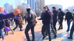 Masked Men Attack Women's Day Rally In Kyrgyz Capital; Police Detain Demonstrators