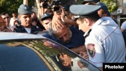 Armenia - Police detain an opposition supporter in Yerevan, 17Jul2016.