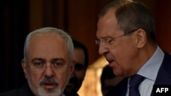 Sergei Lavrov və Mohammad Javad Zarif 