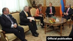 Armenia - President Serzh Sarkisian (R) meets with the U.S., French and Russian co-chairs of the OSCE Minsk Group in Yervan, 2Mar2012.