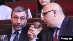 Armenia - Alexander Arzumanian (L) and Khachatur Kokobelian, leaders of the opposition Free Democrats party, at a party congress in Yerevan, 16Mar2012.