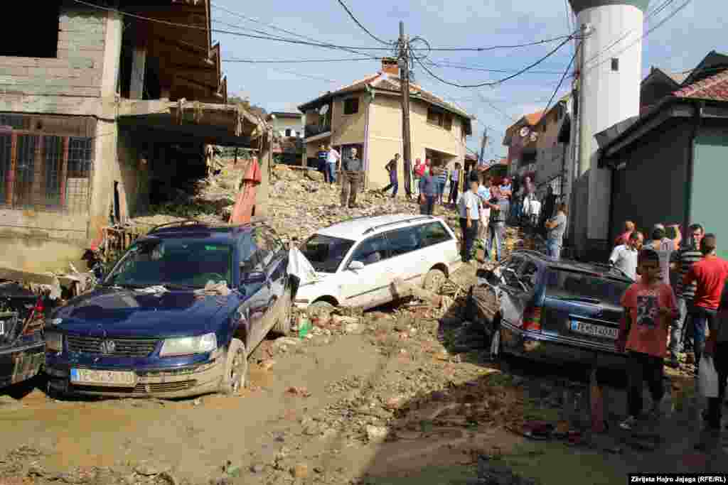 The floods damaged buildings and roads, left at least four people dead, and injured around a dozen. These were the scenes of destruction the following day.