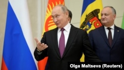 Președinții Vladimir Putin și Igor Dodon la summitul CSI de la Sankt Petersburg, 6 decembrie 2018