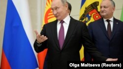 Президент России Владимир Путин и президент Молдовы Игорь Додон