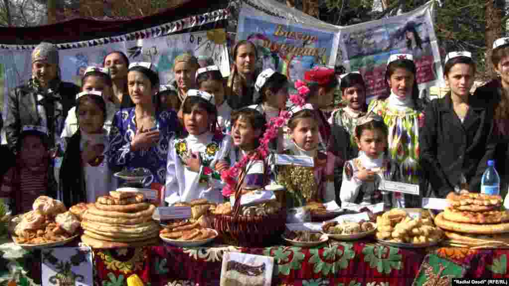 Tajiks are celebrating Norouz, the Persian New Year, which marks the beginning of spring. In the capital Dushanbe, children gather at an outdoor fair with traditional food. 