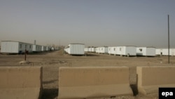 Some 3,000 MKO members were relocated to Camp Liberty (pictured) on the outskirts of Baghdad last year but some 100 people stayed on at Camp Ashraf to deal with leftover property and goods.